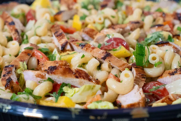 Pasta salad with chicken and mango
